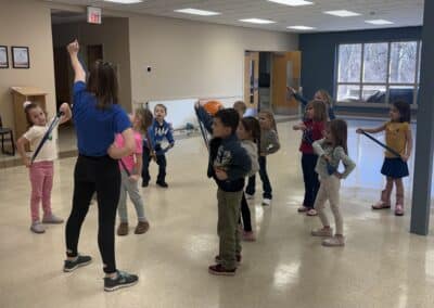 teacher leading sit and fit